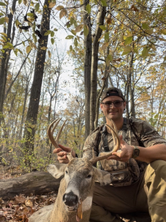 Joe Bacci from Romeo bagged his 8 Point in Washington Twp.  Decided to go out for a quick hunt before training at 1 pm. 8 am rolls around and I’m not seeing anything and figured it was time to drink a bit of coffee. I grab my thermos and just about to pop it open when I see movement out of my right eye. Turned around and see this guy. Fumbled to hurry up and get my thermos back in my bag and grab my bow. He walked behind me about 25 yds out and stops at a scrape. Took my shot and that was that. Bout a 150 yard track! This was my first archery buck and I couldn’t be more pumped!