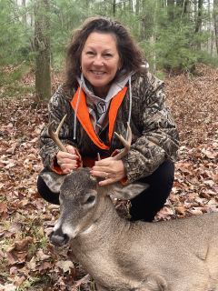 Dolores Borrego from Dearborn Heights bagged her 8 point in Whittemore:  This was the first year actually hunting usually I just go out and sit and look at the deer and this year I used a wicked ridge crossbow and shot and 8pt .  