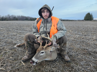 Ty Aron from Mikado Pictured with his 7 point harvested in Posen!