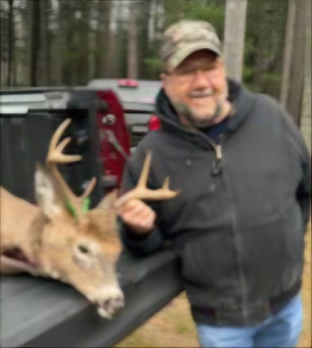 Richard Kuznicki from McComb Ohio bagged his 8 point in Wilber Twp!   It was near the end of the day and I was watching 8 does. They were leaving the area when I saw one more deer in the brush. He walked out from behind the brush, about 50 yds, and I shot him in the neck.
