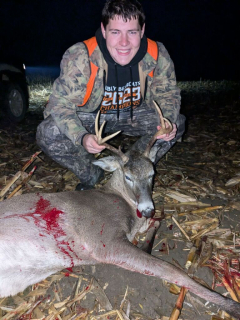 Mitchell Foote from Argyle Bagged a 6 point in Sanilac County! c Noticed the farmer was taking off some corn Monday night and knew we were out of venison burger so best to lay the hammer down on something. Got a doe Monday night and then Tuesday night there was some of the field left on so I sat up on the edge and out he came with another buck, gave me a shot first so I let er rip!