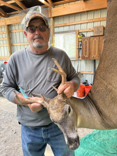 Lou Srebnik from Alpena bagged his 8 point in Alpena!  He came in during the evening hunt. Gave me a good broadside shot. Had a little track job but the whole family including the grandkids and neighbor helped out. 