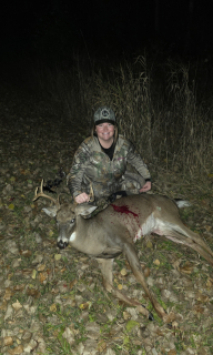 Whitney Rollins from AuGres bagged an 8 point in Arenac County! Being 8 months pregnant, I didn't think I would get out much. 10/28, I decided to go out, and within 30 minutes this eight point came out. I immediately put my camera on him and got m bow ready. Double lung shot and found him within 100 yards.  
