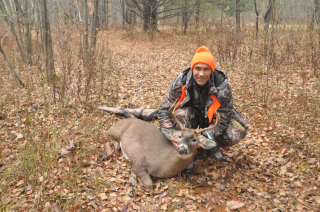 Paul Lange from Dryden bagged his 8 point in Hill Township! We were hunting at my Uncle Chuck's property. My son, Jacob, saw a 8pt buck by his hunting stand. Jacob let this buck go by since he had taken a bigger 8pt buck during bow season. Jacob texted me that a decent 8pt was headed my way. About 2 minutes later the buck showed up at my location. After a few minutes of the buck working a scape, he gave me a 30yd quartering towards shot.