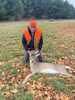 Mike Schmidt from National City bagged his 8 point in East Tawas!   My son-n-law seen it first and said it was a six point I was going to let it pass, but when I looked at it through the binoculars I could see the brow tines and it was a eight point.